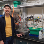 Cong Trinh poses for a photo in his lab